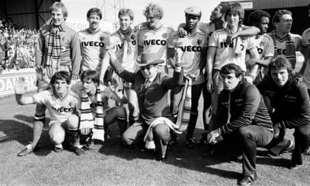 Elton John and Graham Taylor with Watford players in 1983
