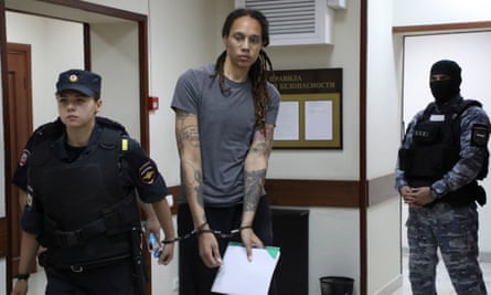 Two-time Olympic gold medallist and WNBA player Brittney Griner is escorted to hear the court’s verdict in a court near Moscow