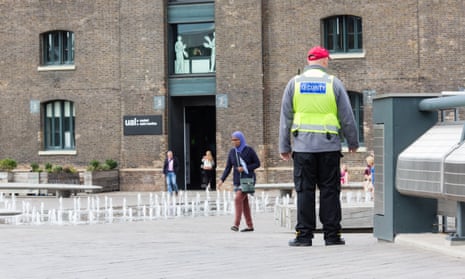 Pseudo-public space … a private security guard in Granary Square, King’s Cross.