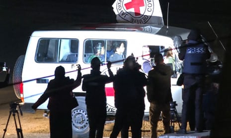 An International Red Cross vehicle reportedly carrying hostages released by Hamas driving towards the Rafah border point with Egypt ahead of their transfer to Israel late on Saturday