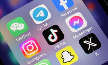 phone screen with lots of social media apps - tiktok, facebook, snapchat and more