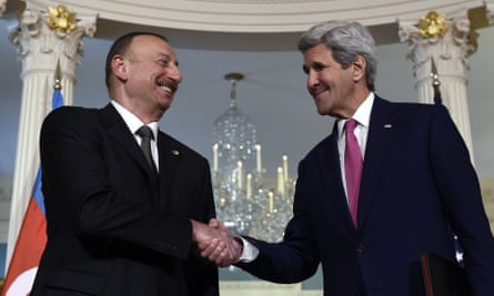 US Secretary of State John Kerry shakes hands with Ilham Aliyev before their meeting at the State Department in Washington in March.