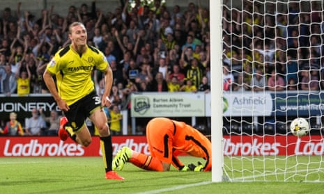 Jackson Irvine celebrates after scoring for Burton Albion in the Championship match against Derby County