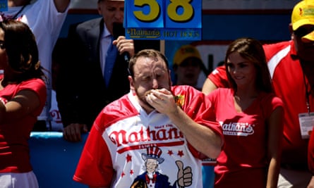 Competitive eater Joey Chestnut holds the current world record of 75 hotdogs in 10 minutes.