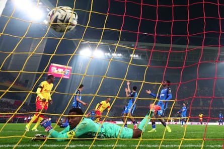 Auxerre’s Donovan Léon watches the ball hit the back of his net