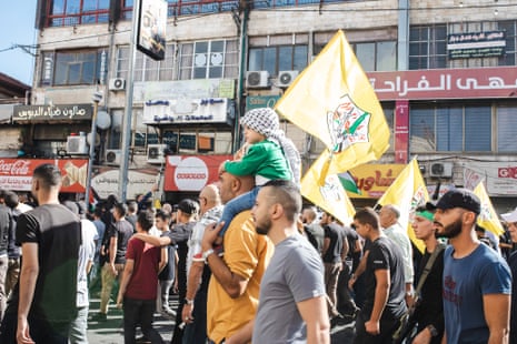 People attend the funeral ceremony of Palestinians those who were killed in yesterday’s raid by Israeli army in Jenin Refugee Camp in Jenin, West Bank.