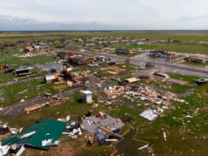This aerial view shows damage to a neighborhood by Hurricane Laura outside of Lake Charles, Louisiana.
