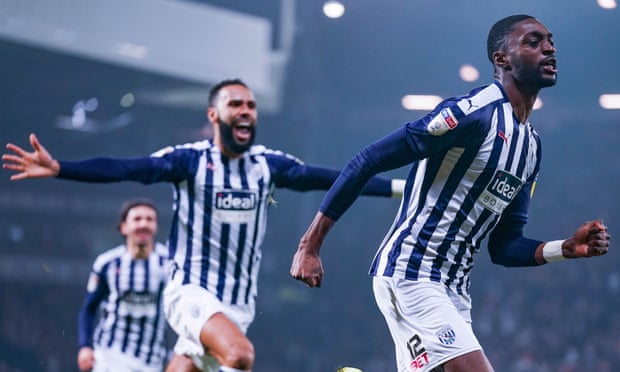 Teammates rush to congratulate Semi Ajayi on giving West Brom a second-minute lead against Leeds