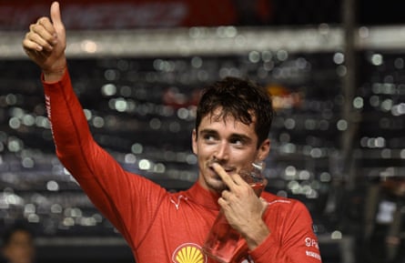 Ferrari’s Charles Leclerc celebrates taking pole position for Sunday’s Singapore F1 GP