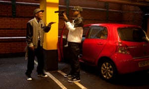 YouTube hero: Jamal, above, filming a west London MC in a supermarket car park.