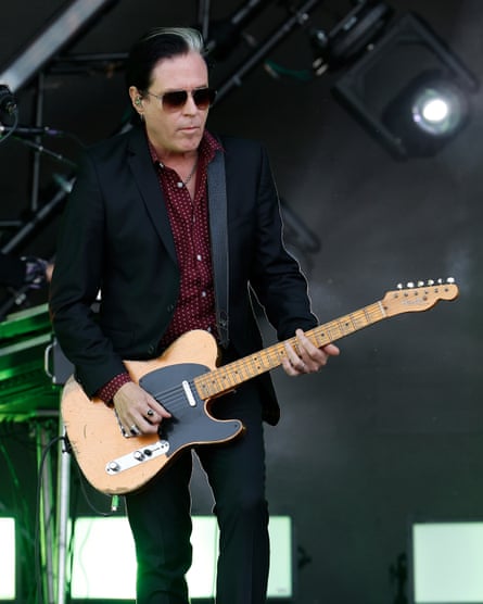 Troy Van Leeuwen of Queens of the Stone Age performs at the 2023 Boston Calling music festival in Boston, Massachusetts.