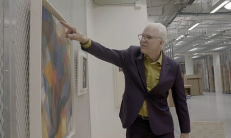 Steve Martin with Synchromy by Stanton MacDonald-Wright, painted in 1917 and now held at MoMA in New York. 