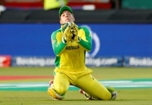 Alex Carey takes a catch to dismiss New Zealand’s Ross Taylor.