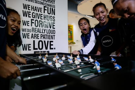Members of the Philippines team play table football in Manila