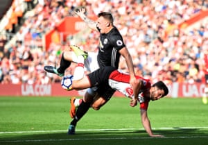 Southampton’s Shane Long is challenged by Manchester United’s Phil Jones during the 1-0 win for United at St Mary’s.