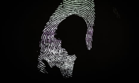Silhouette of a man on a phone against a fingerprint backdrop