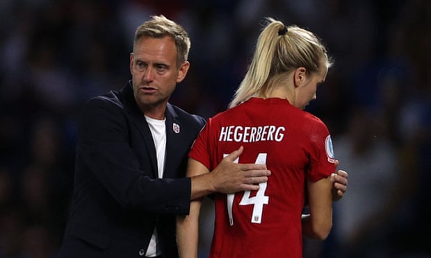 Martin Sjögren consoles Norway’s striker Ada Hegerberg after the defeat by England