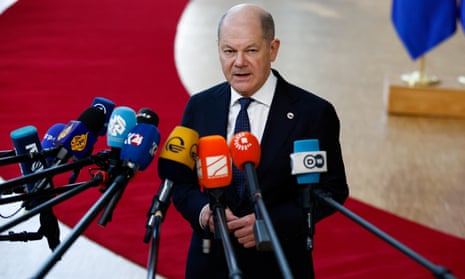 German chancellor Olaf Scholz speaks to the media as he attends a European Union leaders special summit to discuss Ukraine and European defence, in Brussels.