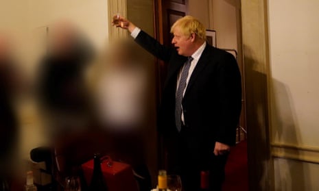Boris Johnson raising glass