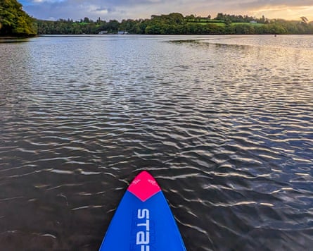 Tom paddleboarding on the River Dart