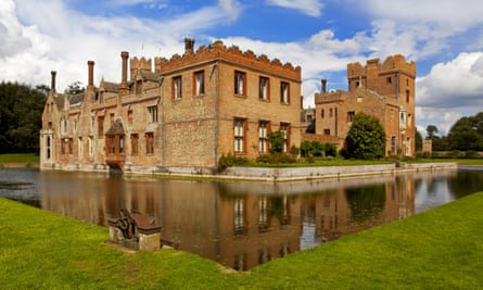 Oxburgh Hall, Norfolk – view of fortified building on square plot of land with moat around it