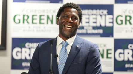 Chedrick Greene smiles arsenic he stands successful beforehand of predetermination posters base his name