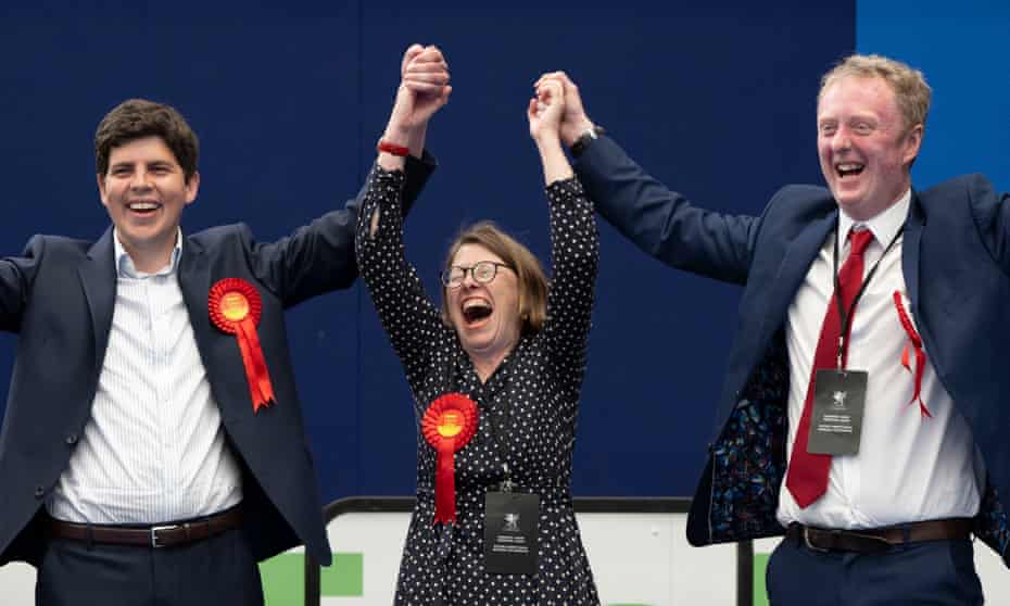 Huw Thomas, Jane Henshaw and Ed Stubbs celebrate after being elected for the Splott ward for Welsh Labour during the election count  on 6 May 2022 in Cardiff, Wales. 
