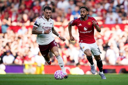 Matheus Cunha runs past Arsenal’s Ben White