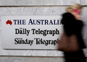 A News Corp employee walks into the company’s Holt Street headquarters in Sydney