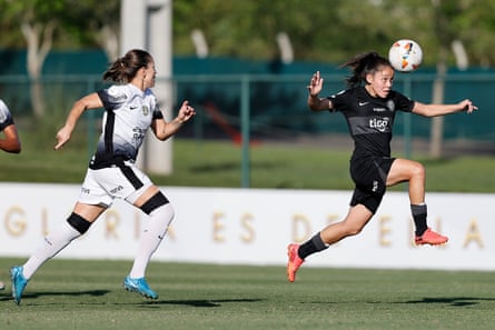 Erika dos Santos of Corinthians fights for the ball with Agustina Varela of Olimpia