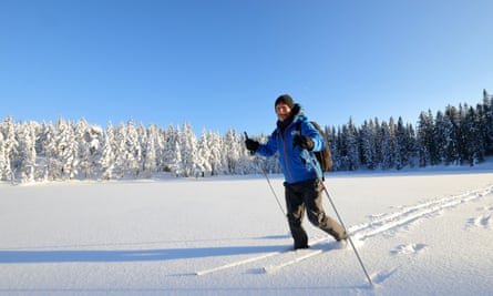 Kevin Rushby crossing a frozen lake near Kobberhaughytta, Norway