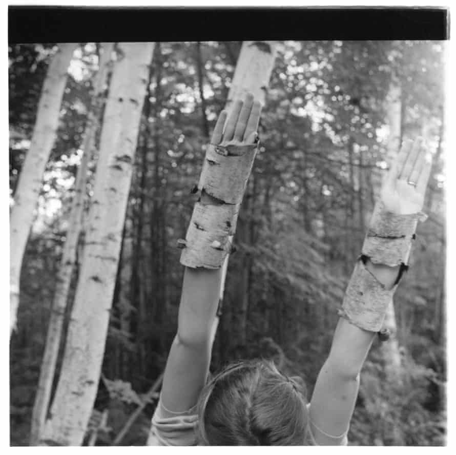 A girl becoming a tree … Francesca Woodman’s upraised arms in birch-bark gauntlets.