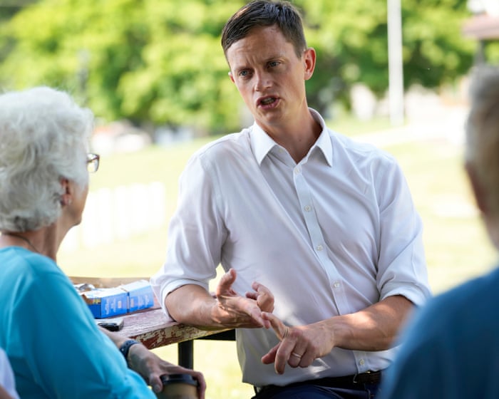 ‘Our democracy is run by two private clubs’: can a pro-hunting Democrat lead a blue wave in Iowa?