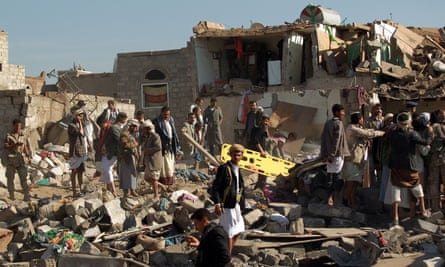 YEMEN-CONFLICTYemenis search for survivors at the site of a Saudi air strike against Huthi rebels near Sanaa Airport on March 26, 2015, which killed at least 13 people. Saudi warplanes bombed Huthi rebels in Yemen, launching a military intervention by a 10-nation coalition to prevent the fall of embattled President Abedrabbo Mansour Hadi. AFP PHOTO / MOHAMMED HUWAIS (Photo credit should read MOHAMMED HUWAIS/AFP/Getty Images)