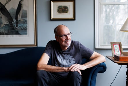 Doug Larson sits on a sofa in a comfortable room at home in Guelph, Ontario.