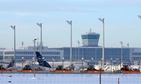 Airport crews clear snow and ice at Munich airport 