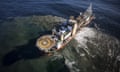 Aerial view of a diamond mining vessel with a helipad at sea