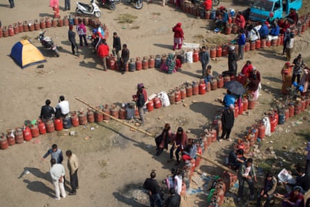 People queue to refill gas cylinders in Kathmandu.