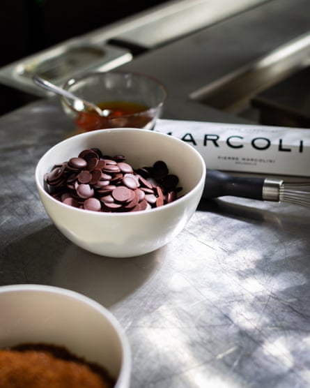 Pierre Marcolini cooking chocolate buttons.