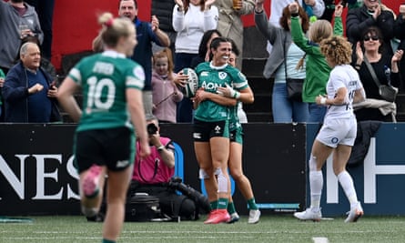 Amee-Leigh Costigan and Irish supporters celebrate a try