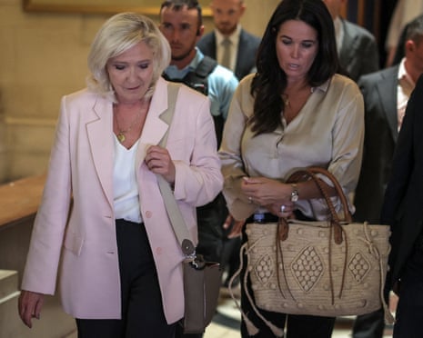Marine Le Pen leave after the verdict in the appeal trial in Paris, France.