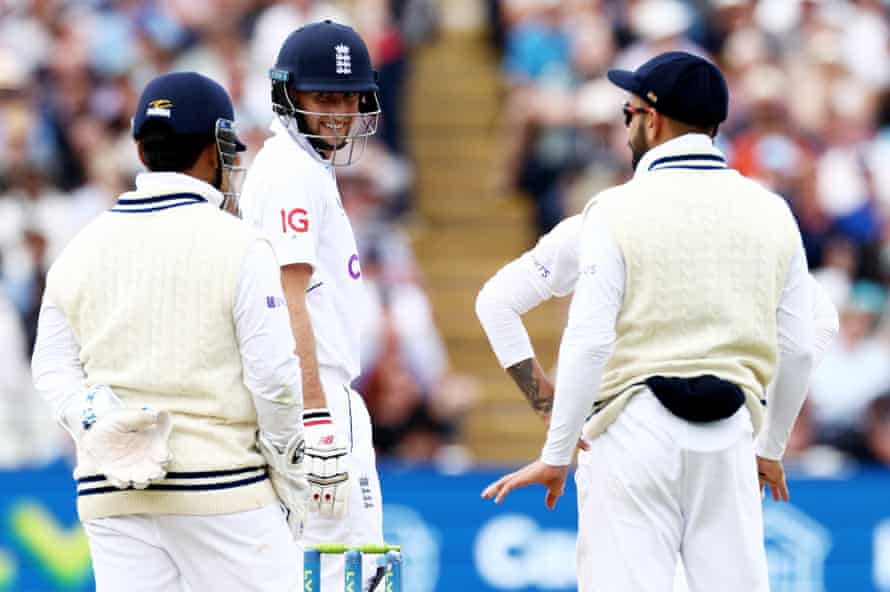Joe Root is all smiles in the middle.