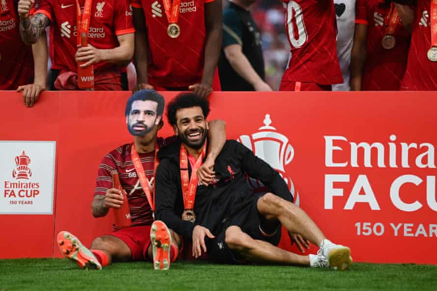 Liverpool’s Thiago Alcantara and Mohamed Salah celebrate after their side’s victory.