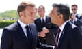 Emmanuel Macron touches Rishi Sunak's arm at D-day celebration