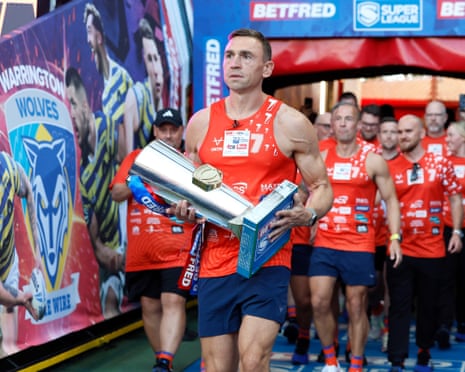 Sir Kevin Sinfield brings out the trophy ahead the Super League Grand Final at Old Trafford.
