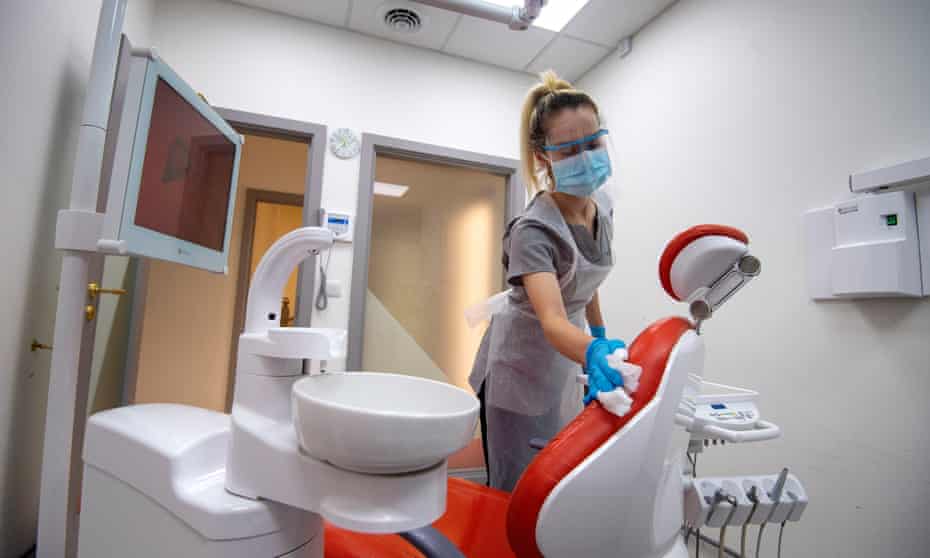 Coronavirus - Mon Jun 8, 2020A dental nurse cleans the examination room after treating a patient.
