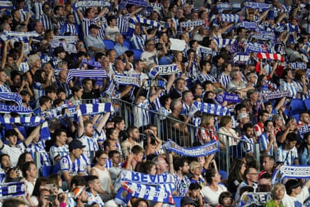 Real Sociedad’s supporters cheer their team on against Athletic