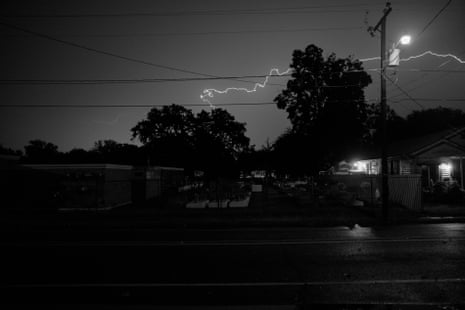 Lighting strikes across the street from Lesley Wilson’s home in New Iberia, Louisiana