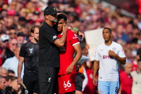 Arsenal v Manchester United: Premier League – live updates | Premier League 5 Trent Alexander-Arnold gets a hug from manager Jurgen Klopp after leaving the pitch injured.