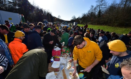 Farmers take a lunch break on the A20 highway near Saint-Maur